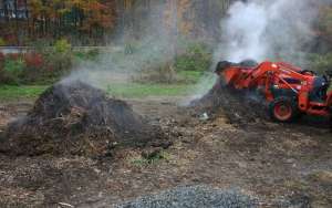 Flipping hot compost pile